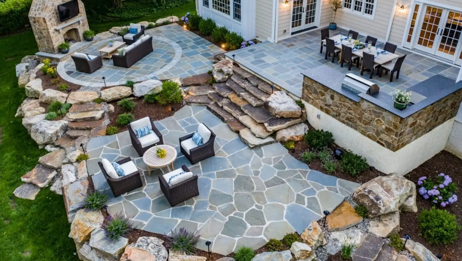 Creative stone patio designs that elegantly elevate your backyard into a stylish oasis
