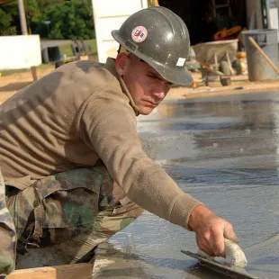 Above Average Concrete Inc. logo