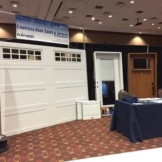 Courtesy Door Sales & Service logo