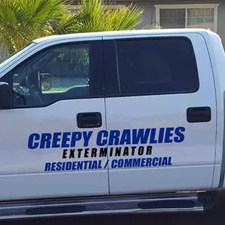 Creepy Crawlies Exterminator logo