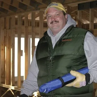 Dave Erwin Construction, Inc. logo