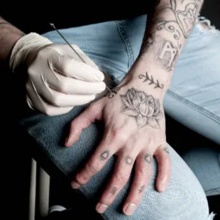 Dog Nuts Tattoos LLC logo