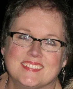 Donna Precise McDuffie Designs logo