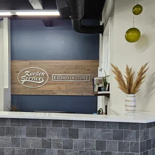Etched In Stone logo