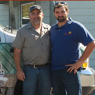 Eustis Roofing Co. logo
