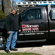 Homan Garage Door logo