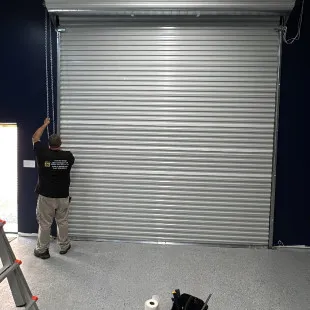 In and out garage doors llc logo