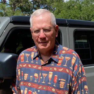 John P. Guy, Designer logo