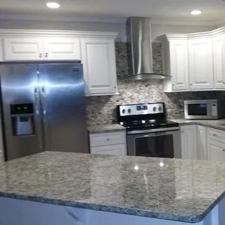Kitchens and Bath by Design logo