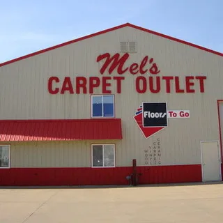 Mel's Carpet Outlet logo