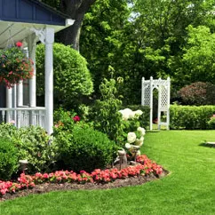 Mel's Lawn & Landscape Maintenance logo