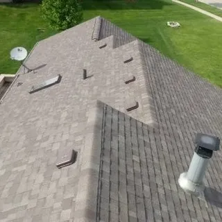 Nicks roofing & Siding logo
