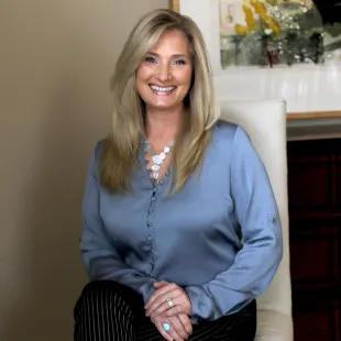 Patricia Emmick Interior Designs logo