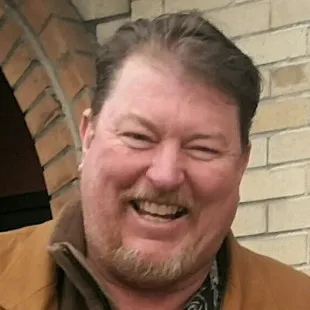 Patrick K Olson Construction logo