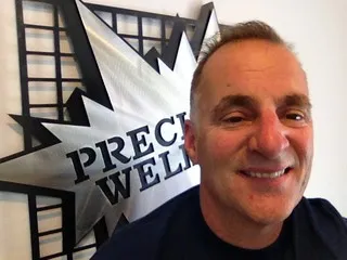 Precision Welding logo