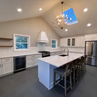 Ray's Elite Remodeling logo