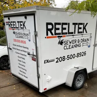 ReelTek Sewer & Drain Cleaning logo