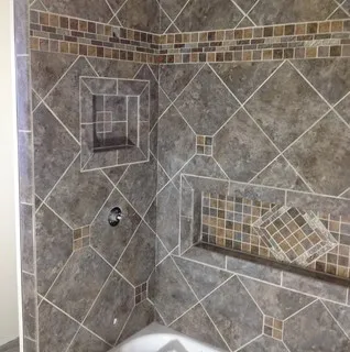 Schmidt Masonry & Tile logo