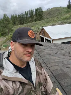 Shawn's Tile & Construction logo