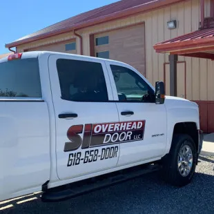 SI Overhead Door logo