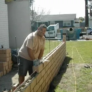 Specialty Masonry logo