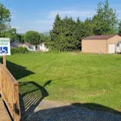 Spots construction and lawncare logo