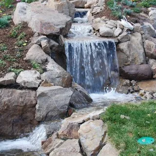 Spring Creek Land & Waterscapes logo