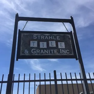 Strahle Tile & Granite logo