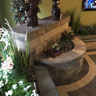 T&J Landscape Services logo