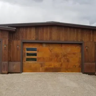 The Garage DoorMan logo