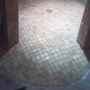 The Tile Guy logo