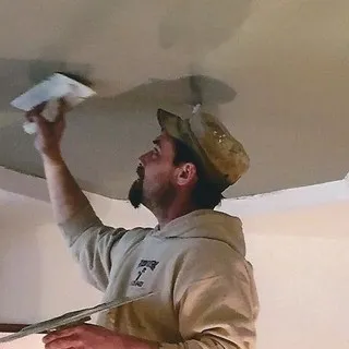 Truitt Erickson Plastering logo