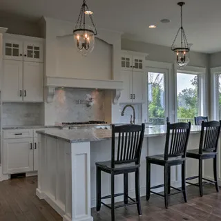 Unique Custom Home Plans, LLC logo