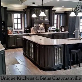 Unique Kitchens & Baths INC logo