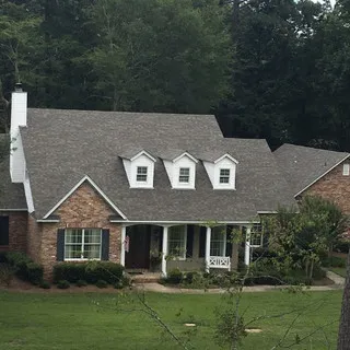 United Roofing and Construction logo
