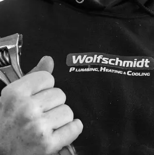 Wolfschmidt Plumbing Heating And Cooling logo