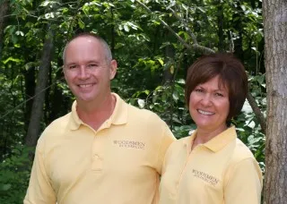 Woodsmen Builders, Inc. logo