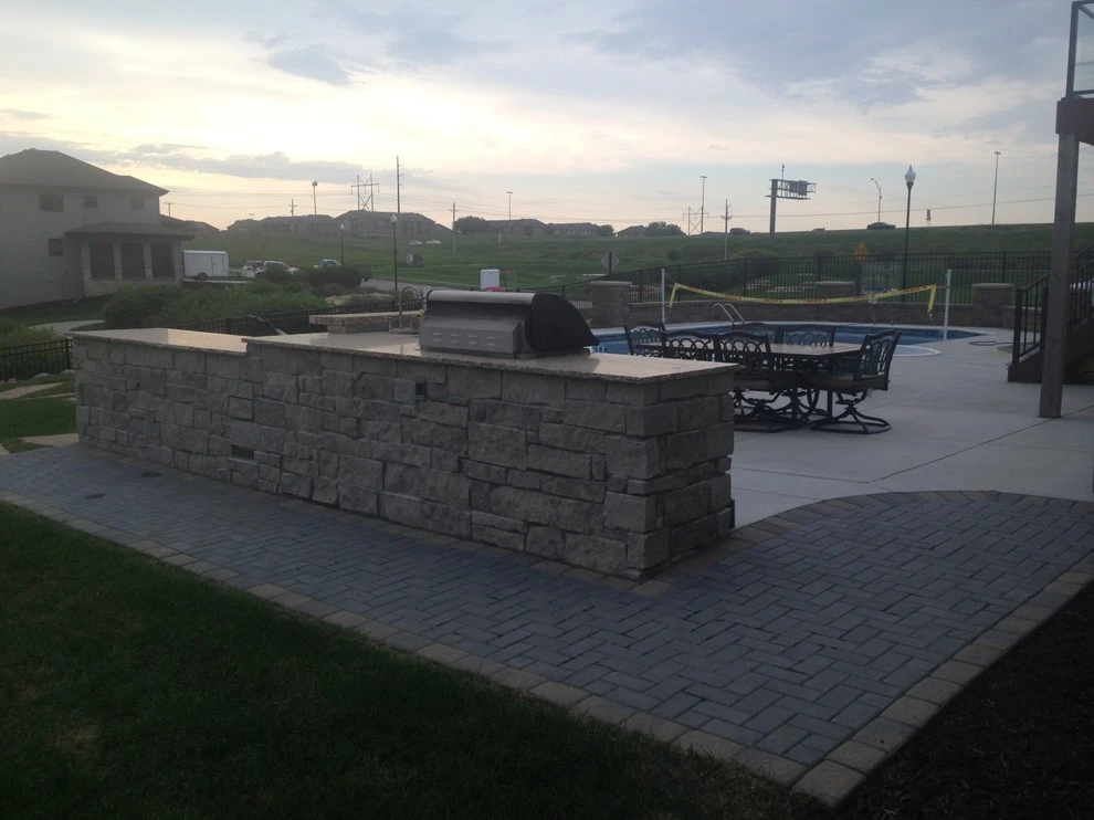 Belgian Block Seating Wall, Granite Boulder Retaining Wall, Paver Patio by Above And Beyond Complete Grounds Maintenance - Photo 7