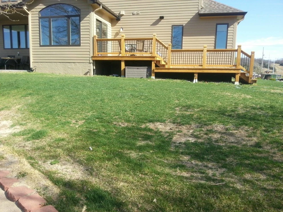 Boulder Retaining Wall by Above And Beyond Complete Grounds Maintenance - Photo 8