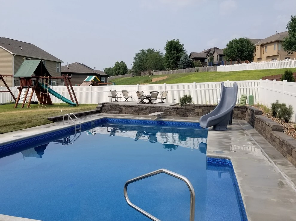 Swimming Pool with 8" Clifton Wall by Above And Beyond Complete Grounds Maintenance - Photo 3