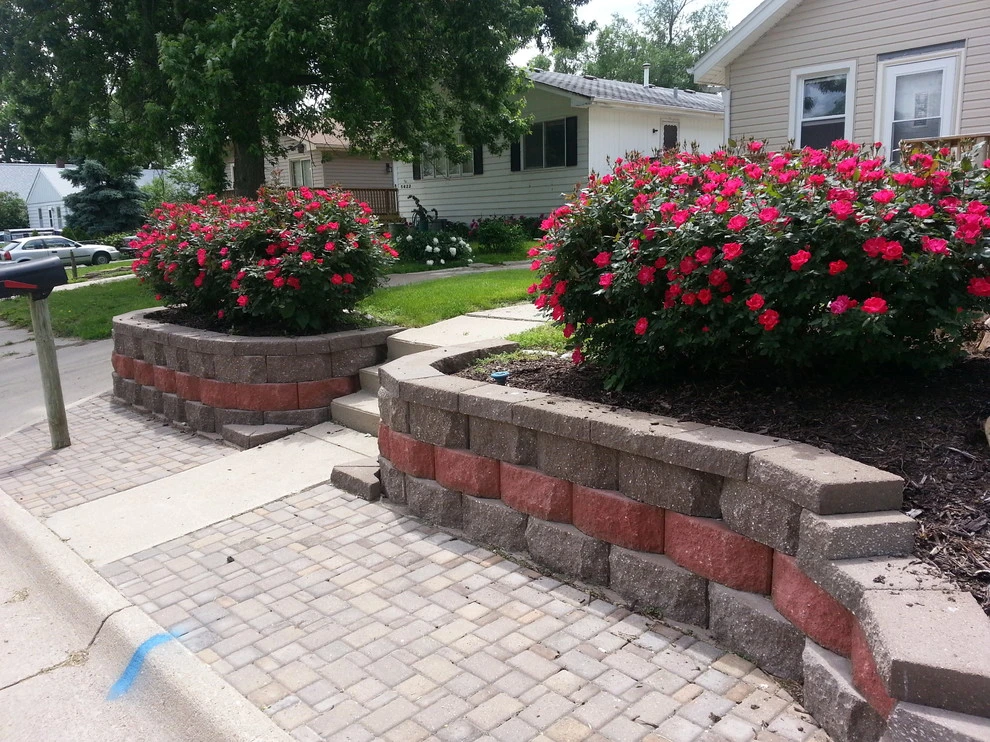Colorful Retaining Wall by Above And Beyond Complete Grounds Maintenance - Photo 2