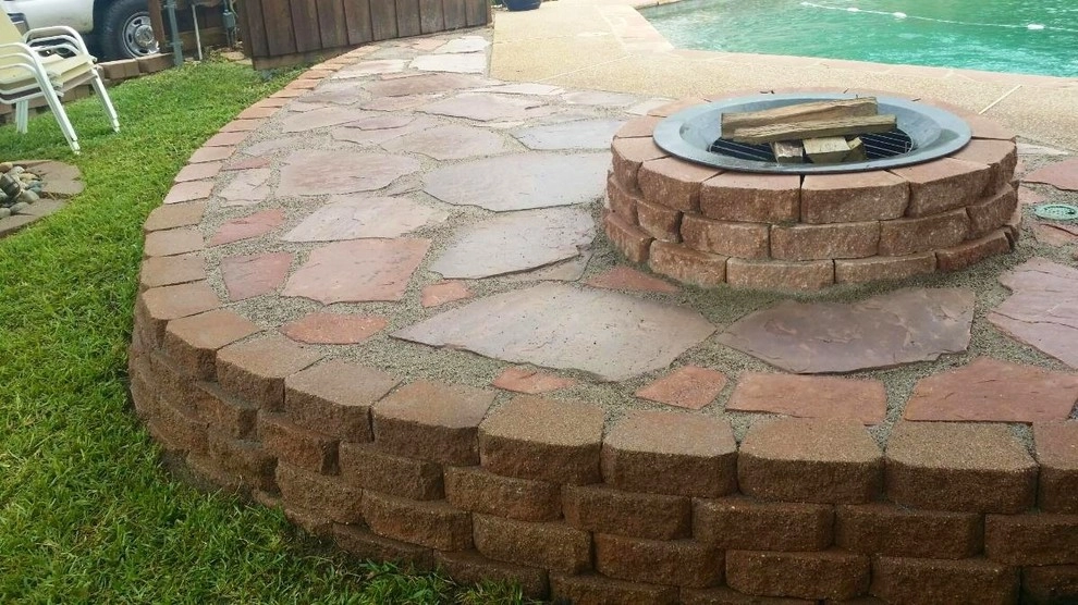 Pool hardscape expansion with fire pit by Absolutely Bushed Landscaping - Photo 6
