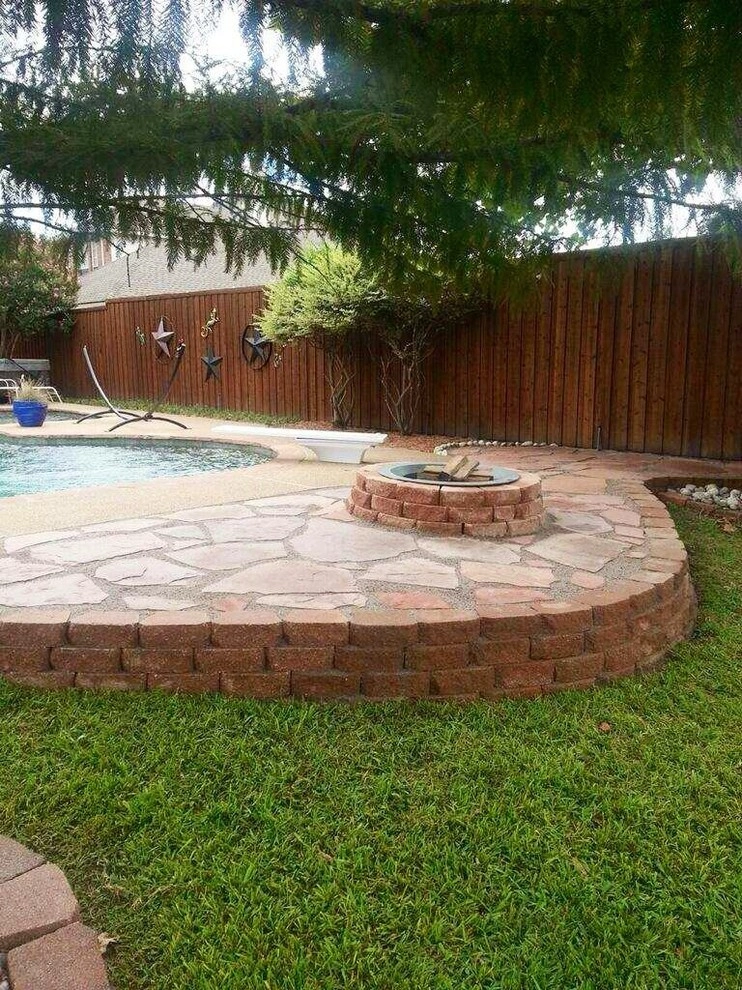 Pool hardscape expansion with fire pit by Absolutely Bushed Landscaping - Photo 5