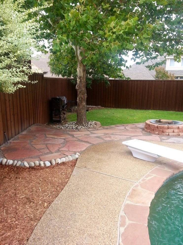 Pool hardscape expansion with fire pit by Absolutely Bushed Landscaping - Photo 4