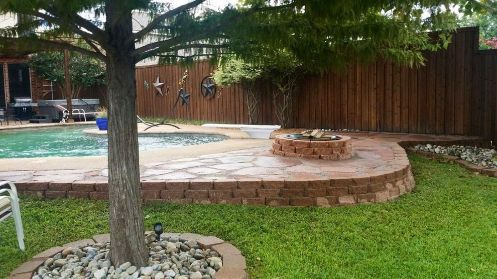 Pool hardscape expansion with fire pit by Absolutely Bushed Landscaping - Photo 8