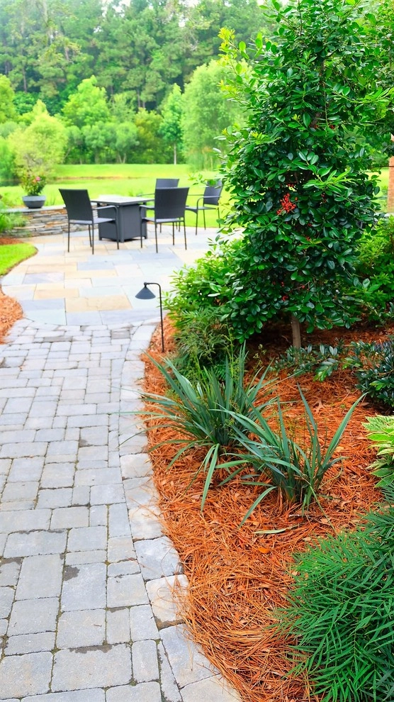 Blue stone patio and pond view by Green Grass Landscape Contractors - Photo 4