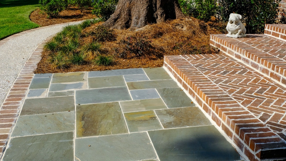 Stately tabby and brick by Green Grass Landscape Contractors - Photo 4