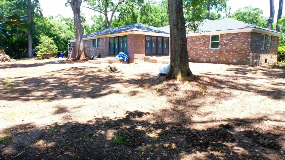 Stately tabby and brick by Green Grass Landscape Contractors - Photo 3