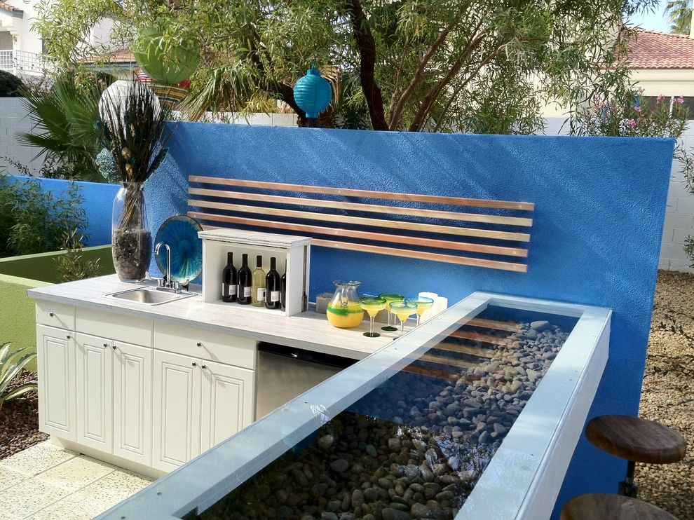 Outdoor party place by Green Planet Landscaping Pools & Spa - Photo 8