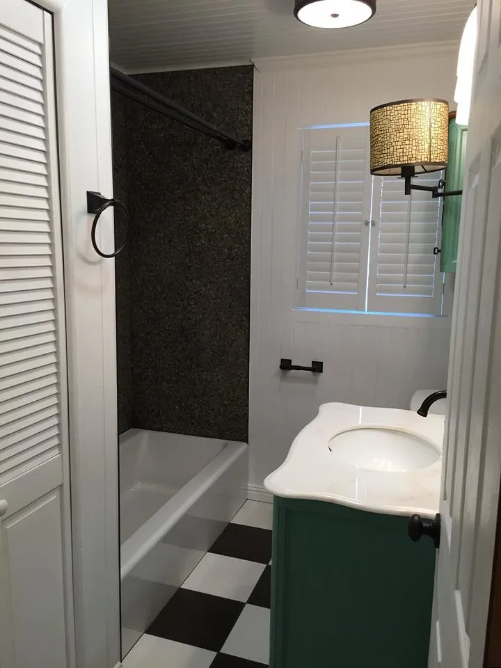 Vintage-Inspired Compact Bathroom Remodel by Technically Aesthetic General Contractors - Photo 3